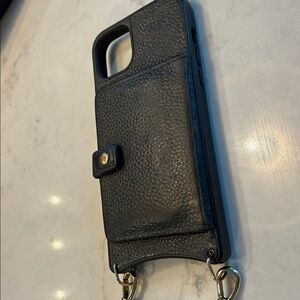 Black leather Bandolino Case Apple 14 plus along with a charger